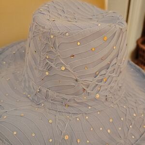 Elegant Light Blue Hat with Gold Accents